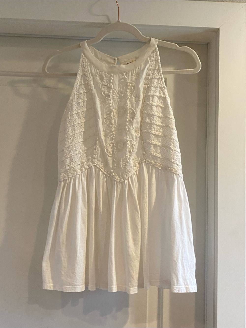 White Sleeveless Embellished Tank top.